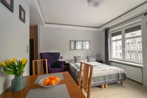 Posedenie v ubytovaní Apartament SZEROKA