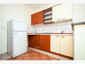 Kuchyň nebo kuchyňský kout v ubytování Apartmani Marica