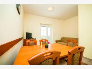 TV a/nebo společenská místnost v ubytování Apartmani Marica