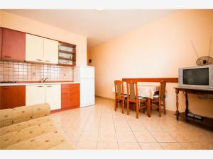 Kuchyň nebo kuchyňský kout v ubytování Apartmani Marica