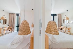 Кровать или кровати в номере Cumeja Beach Club & Hotel