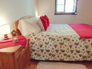 Ein Bett oder Betten in einem Zimmer der Unterkunft Albergo Riglarhaus