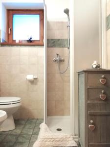 Ein Badezimmer in der Unterkunft Albergo Riglarhaus