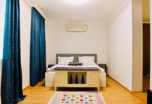 Postel nebo postele na pokoji v ubytování Nana's Home