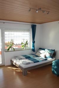 Postel nebo postele na pokoji v ubytování CasaJansen - Große Wohnung im Dreistädte-Eck