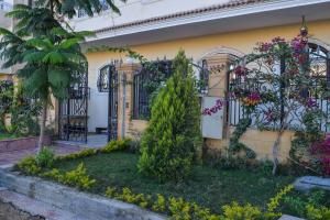 A garden outside Jamila cosy apartment