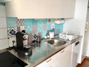 Kuchyň nebo kuchyňský kout v ubytování Casa Micheroli Parterre
