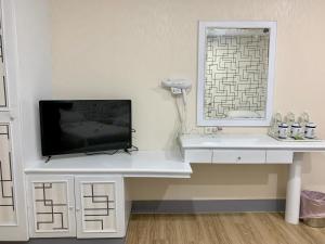 TV a/nebo společenská místnost v ubytování Fu Hwa Homestay + 34 fotografií