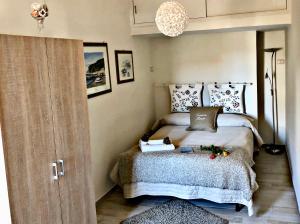 Postel nebo postele na pokoji v ubytování Vesuvio House appartamento indipendente e centrale