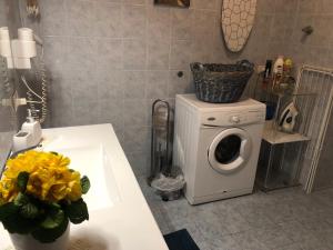 Kuchyň nebo kuchyňský kout v ubytování Vesuvio House appartamento indipendente e centrale