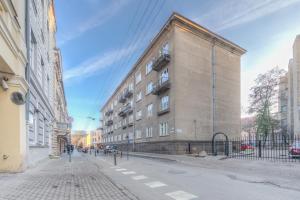 a building on the side of a city street at Center Apartment, Vilnius, Old Town in Vilnius