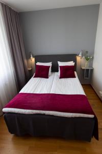 Postel nebo postele na pokoji v ubytování City Central Hotel Örebro by First Hotels