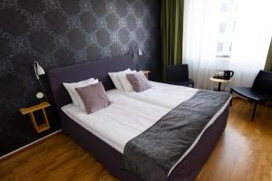 Postel nebo postele na pokoji v ubytování City Central Hotel Örebro by First Hotels