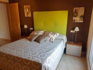 Posteľ alebo postele v izbe v ubytovaní Atico Duplex Llandells 21