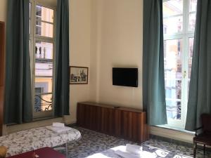 Posteľ alebo postele v izbe v ubytovaní Nunziata Apartment