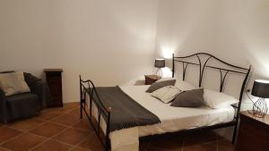 Postel nebo postele na pokoji v ubytování Slow Umbria 05039
