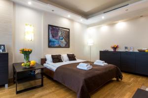 Cama o camas de una habitación en Abra Apartment