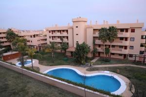 Bazén v ubytování Residencial Cala Azul nebo v jeho okolí