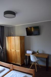 Voodi või voodid majutusasutuse Hamburger Alm Hotel St. Pauli toas