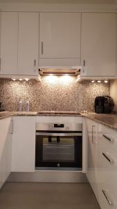 Dapur atau dapur kecil di Apartament Les Delícies
