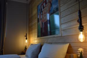 Voodi või voodid majutusasutuse Hamburger Alm Hotel St. Pauli toas
