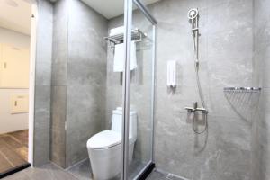 Koupelna v ubytování Apause Hotel + 37 fotografií