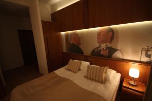 Posteľ alebo postele v izbe v ubytovaní Hotel Vabank