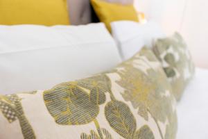 Cama ou camas em um quarto em Graça Apartment
