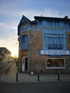 a building with a sign that reads la maison hype at maison quiberonnaise in Quiberon