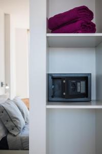 Postel nebo postele na pokoji v ubytování Apartamentos Ocean View