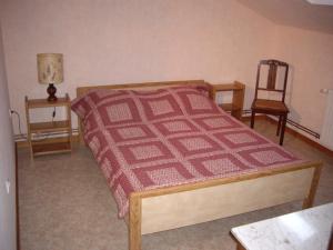 Llit o llits en una habitació de Gîte du Frankenbourg
