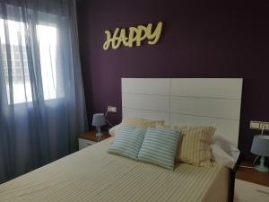 Posteľ alebo postele v izbe v ubytovaní Atico Duplex Llandells 21