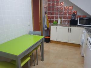 Kuchyňa alebo kuchynka v ubytovaní Atico Duplex Llandells 21