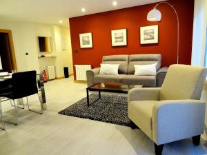 A seating area at Les Cotolles Centro