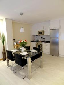 A kitchen or kitchenette at Les Cotolles Centro