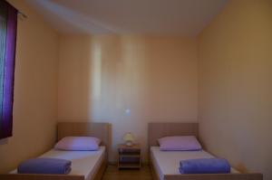 Postel nebo postele na pokoji v ubytování Apartment Viveniti