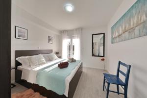 Posteľ alebo postele v izbe v ubytovaní Holiday Home Hrast