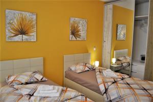 Ένα ή περισσότερα κρεβάτια σε δωμάτιο στο Guest Apartment Balkan