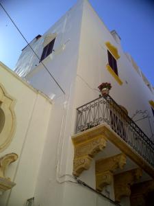 En balkon eller terrasse på Le Perle dello Jonio