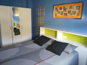 a lego bedroom with a bed and a cabinet at LUR ETXEA in El Valle