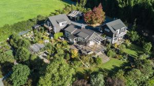 an aerial view of a large house with a yard at Treghan Luxury Lodge in Kerikeri