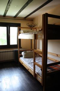 Postel nebo postele na pokoji v ubytování Hikers Hostel