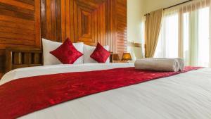 Ein Bett oder Betten in einem Zimmer der Unterkunft Ogix Cliff Paradise