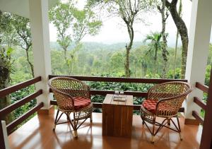 Balkón alebo terasa v ubytovaní Dhanagiri Home Stay