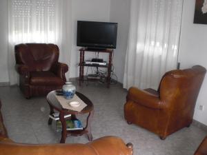 TV a/nebo společenská místnost v ubytování Hotel Branco II + 12 fotografií