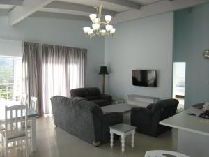 Khu vực ghế ngồi tại Myoli Holiday Apartments