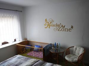 Postel nebo postele na pokoji v ubytování Ferienhaus "Am Gutspark"