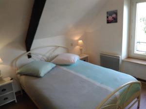 Ліжко або ліжка в номері Appartement de Plage