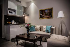 Kuchyň nebo kuchyňský kout v ubytování Naylover Hotel Suites