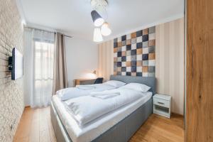 Posteľ alebo postele v izbe v ubytovaní Aura II, Sun & Snow